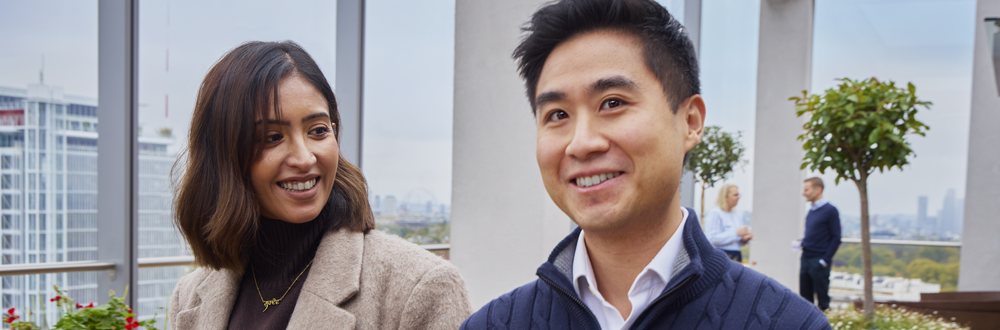 a man and a woman smiling