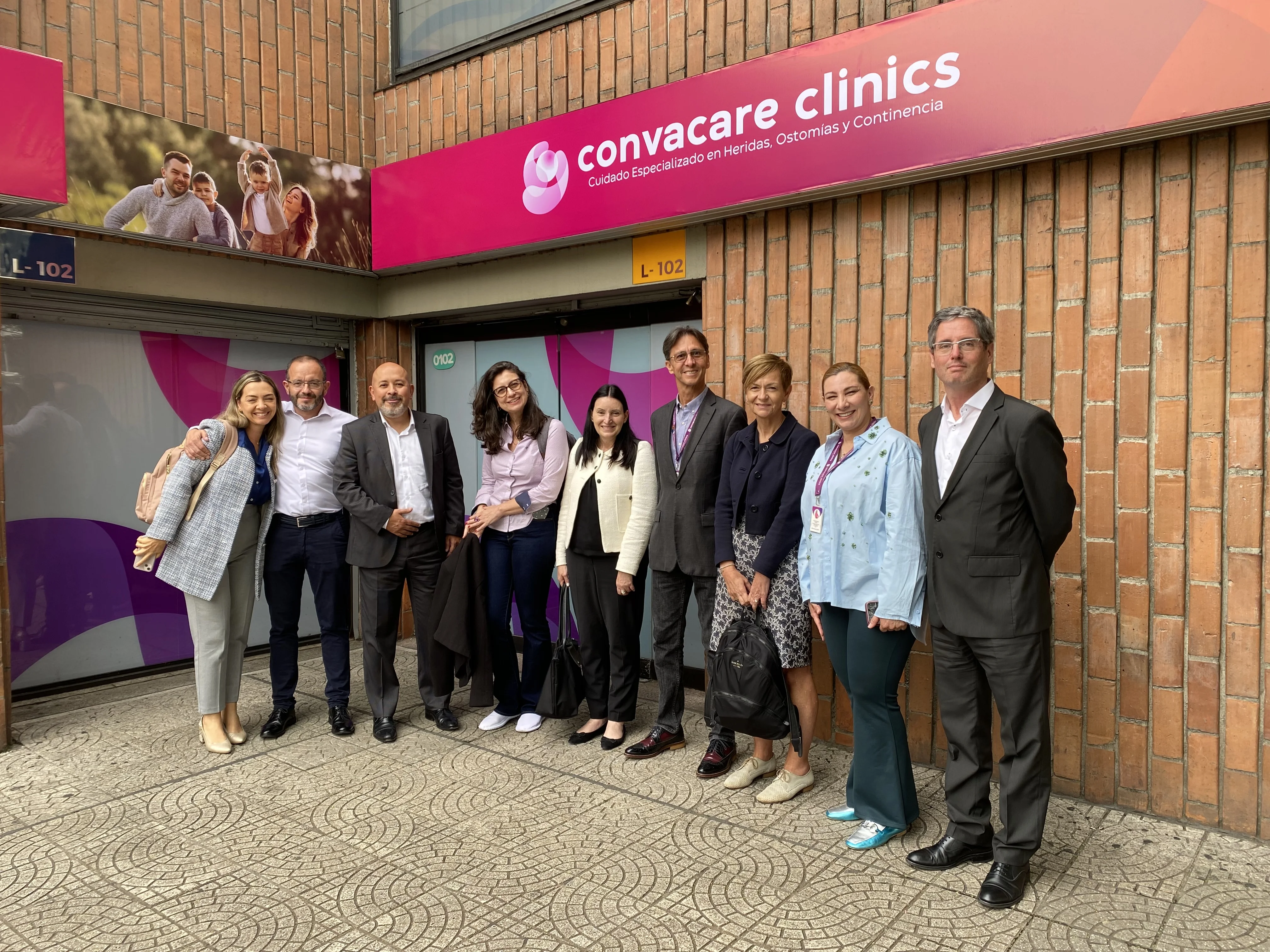 a group of people posing for a photo