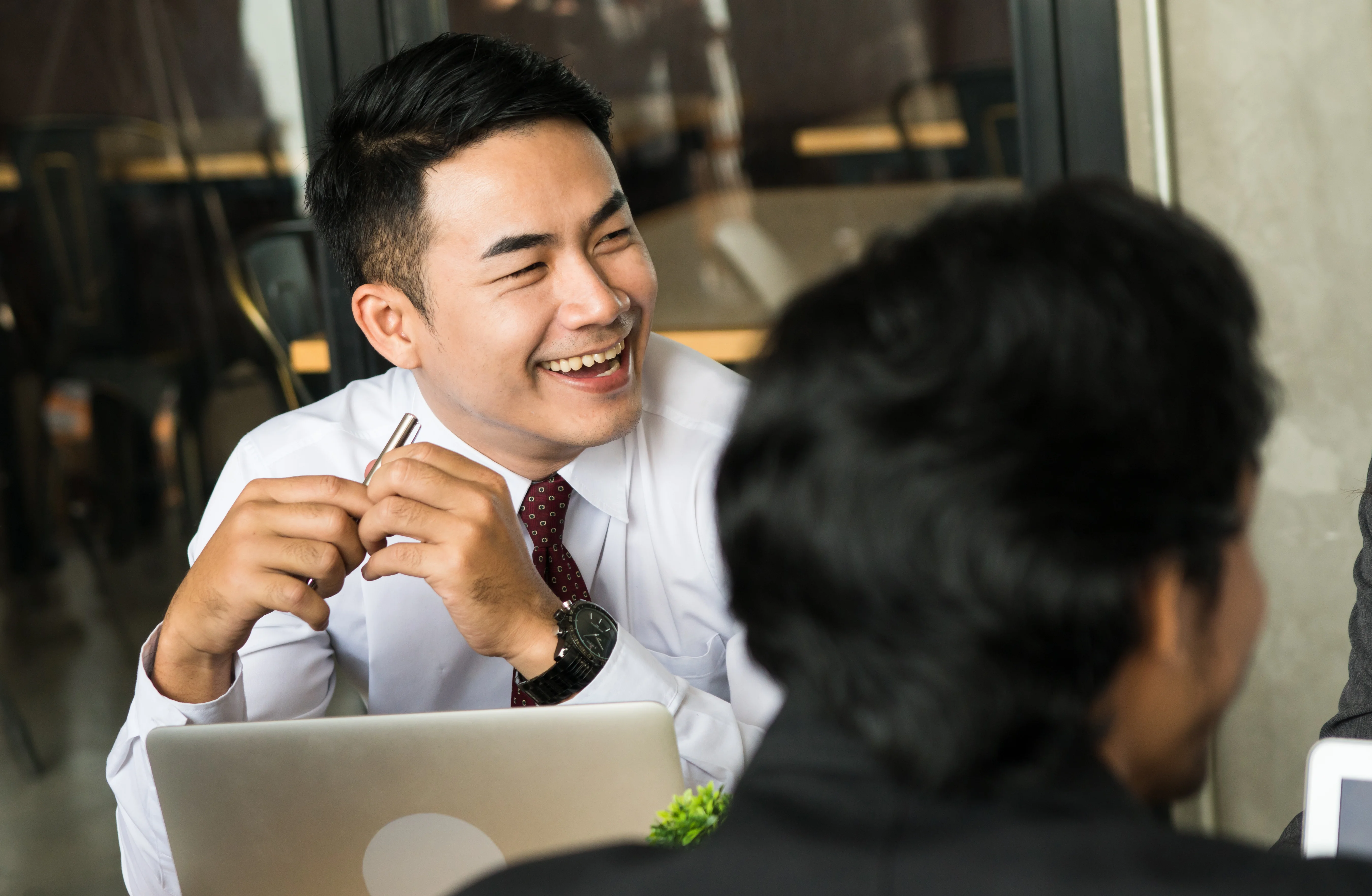 a man and a woman laughing
