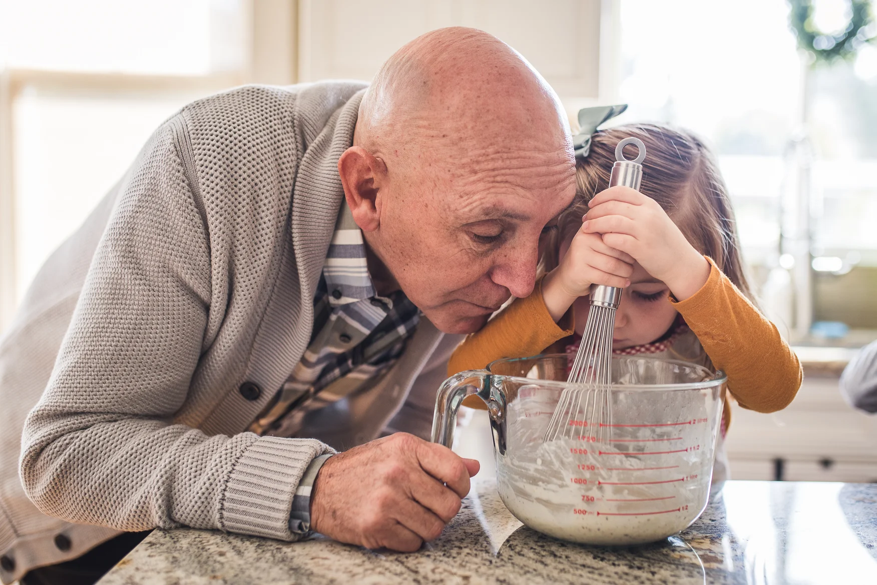 a person looking at a glass