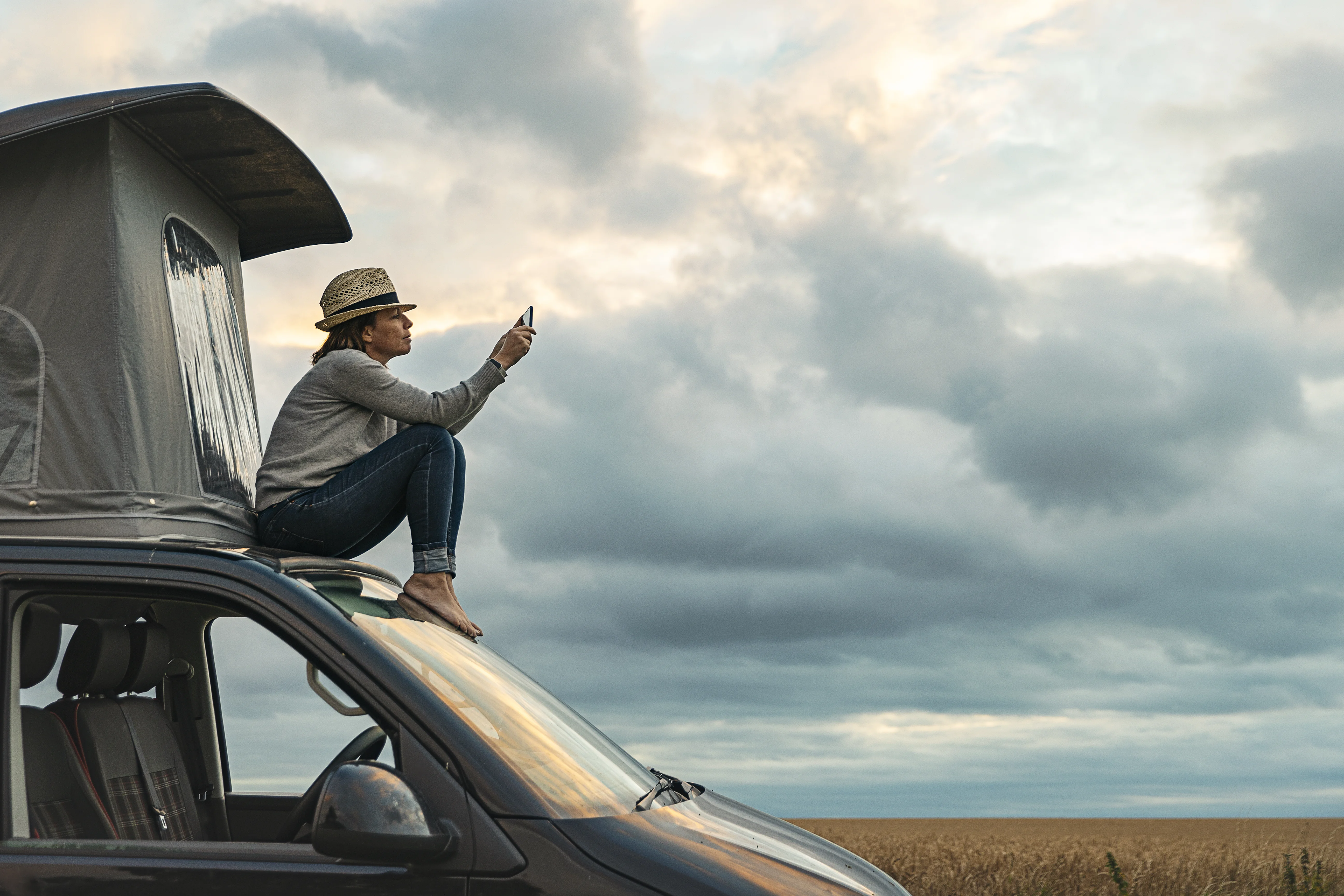 a person sitting on a car