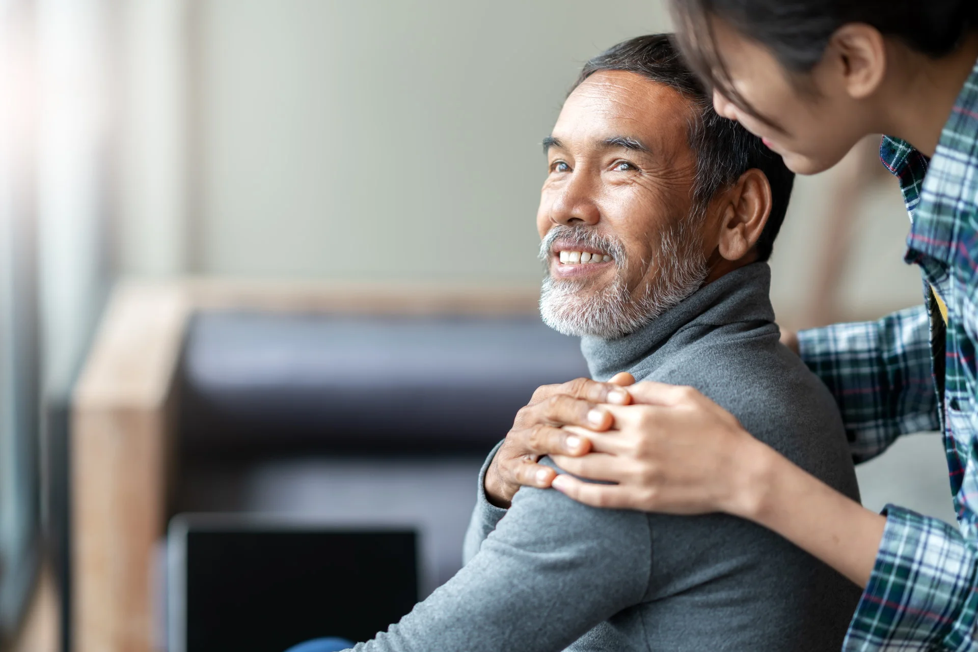 a man holding another man's hand