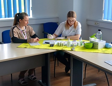 a few women sitting at a table